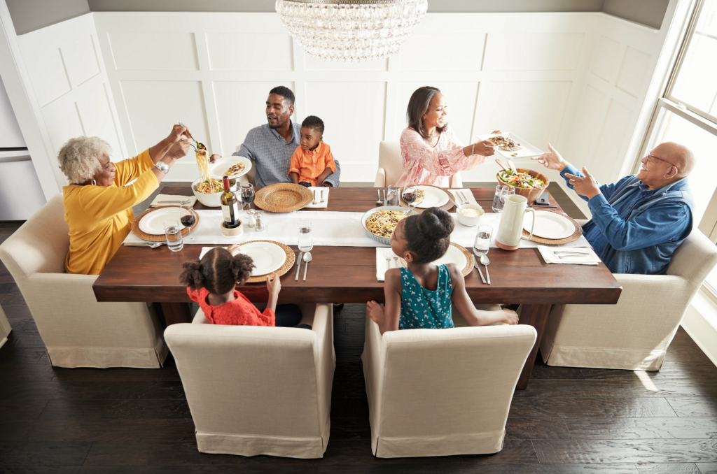 Family having breakfast at the dining table | The FloorWorks | Bethlehem, NH